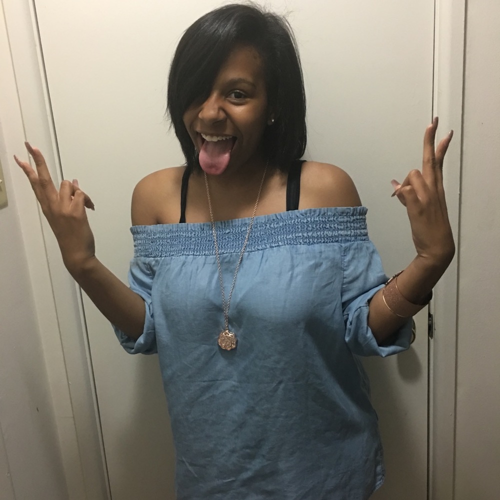 A denim off the shoulders shirt